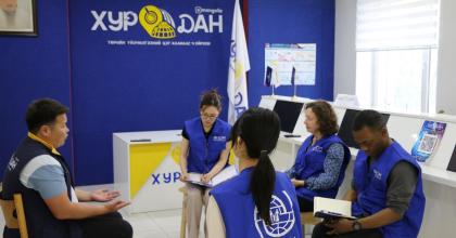 Minkyung Cho, fully funded UN Volunteer Associate Officer during an interview with local NGOs on voluntary return to rural areas.