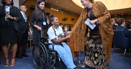 Dorice Mkiva, UN Volunteer Knowledge Management Officer with UNICEF meets Amina Mohammed, Deputy Secretary-General of the UN at the Summit of the Future in New York on 21 September.