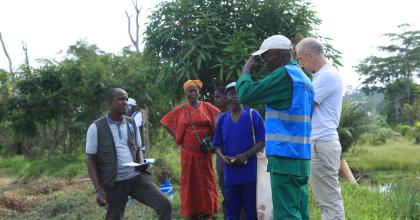 Jean-Martial Konan (right) UN Volunteer Monitoring and Evaluation Specialist at a UNDP mission to the Ayedi fish farm in Zéaglo, Guiglo Department.