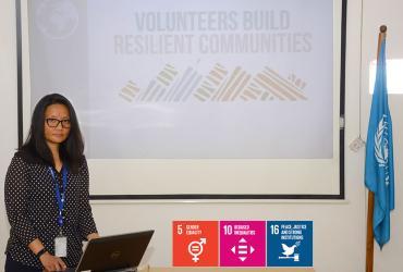 Trishna Bantawa (Nepal), UN Volunteer Field Coordination Officer with UNAMA makes a presentation about how volunteers build resilient communities, on the occasion of International Volunteer Day 2018.