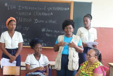 Arminda Ceita (third from right) UN Volunteer Adolescent Engagement Officer with UNICEF leads a classroom discussion in São Tomé and Principe.