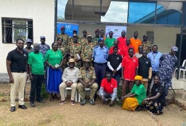 Nuwan Uddika Liyanage (left) UN Volunteer Human Rights Officer with the United Nations Mission in South Sudan attends a training session with community members in Malakal, South Sudan.