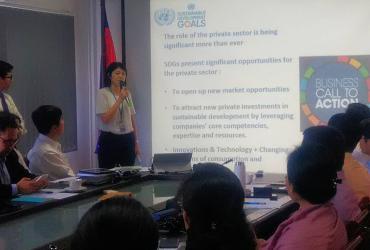 UN Volunteear Mihoko Yotsui (Japan) during a presentation to private sector partners on localizing the Sustainable Development Goals in Cambodia.