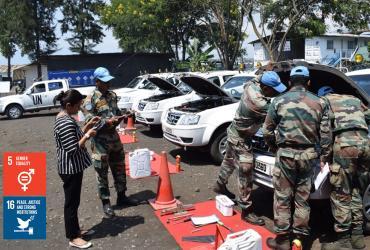 UN Volunteer Database Assistant Shahin Praveen (India) serves with MONUSCO. Here, she is seen inspecting contingent-owned equipment in Goma, DRC.