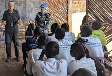 Fabio Arditi (right) is a UN Volunteer Staff Councellor with UNMISS. In this photo, he leads a wellness training with community members in Wau, South Sudan.