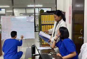 FFT volunteer Nisanart Yeamkhong supports the COVID-19 data entry and processing team at the Royal Centre for Disease Control in Bhutan as part of her work to set up a quality management system in the laboratory. 
