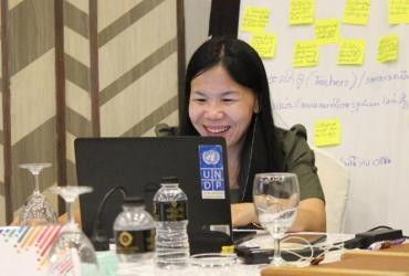 Seevue Xaykia, UN Volunteer Inclusion Specialist with UNDP co-facilitates a workshop for the Organization for Persons with Disabilities in Vientiane.