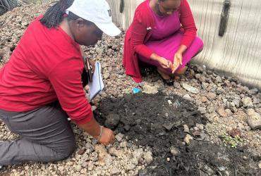 Wanjiku Eva Muthoni (right) and Kebbeh W. Baysah (left) UN Volunteer Environmental Officers with MONUSCO conduct environmental inspection in the Democratic Republic of the Congo.