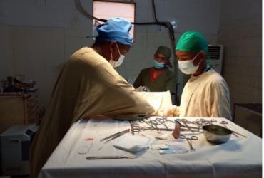 Dr. Sadoscar Hakizimana (left) UN Volunteer Reproductive Health Expert with UNFPA performs surgery in a small hospital in Ambovombe in South Madagascar.