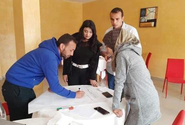 UN Volunteers serving with UNDP Tunisia as part of a Peacebuilding Fund project, during a workshop to plan an internal communication strategy (clockwise from left): Zied Hajji, Nermine Souissa, Riadh Beji and Dalila Ksir.
