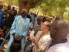 Mariagiovanna Costa delivering cash transfers to internally displaced persons  in the Djene Commune