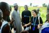 UN Volunteers interact with local communities in Guinea-Bissau on solutions for clean water, healthcare, and justice in remote areas.