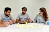 (From left to right) Online volunteers with UNDP Abdullah Amer, Mohammed Salahadin, and Aya Salam attend a workshop run by the Accelerator Lab in Erbil.