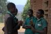Student volunteers in Malawi discussing gender-based violence issues and solutions. 