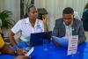 Priyanka Mais (left) UN Volunteer at an event centered on evidence-based decision and policy making in Jamaica.