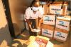 National UN Youth Volunteer Arlene Gisele Gafura transfers the required materials needed for mechanisms of COVID-19 prevention and protection to the Ministry of Public Health in Bujumbura, Burundi