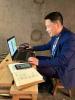 UN Volunteer Zhao Tiansong provided support from a remote office during COVID-19 response efforts 