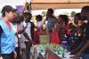 Shuhei Nishiyama (left) UN Volunteer Associate Protection Officer with UNHCR at Nakivale refugee settlement supported young people in activities on Youth Talent Day.