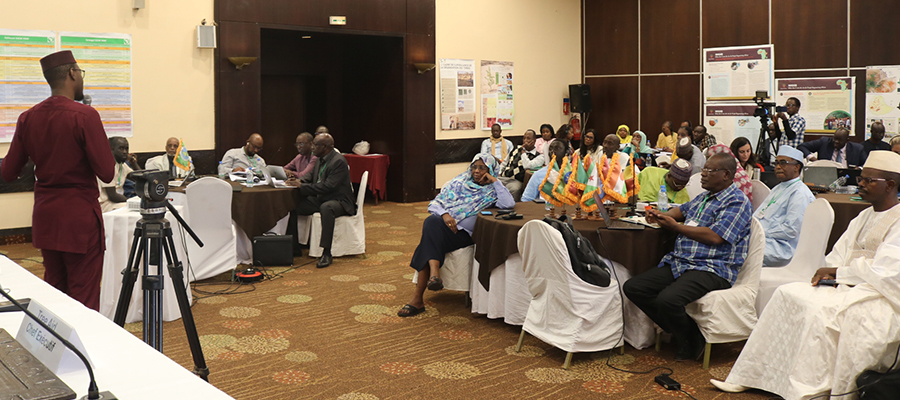 January 2023, Bamako, Mali. Gilles Amadou Ouedraogo in red  addressing the audience during the 2nd Annual GGW Residential Seminar Organized by the Pan African Agency for the GGW. Photo Credit: Tounkara, ICRAF.