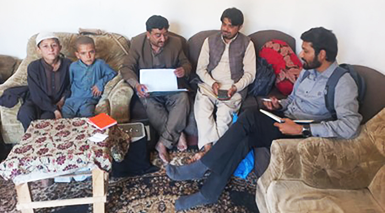 Muhammad Umair, national UN Volunteer Data Entry Operator with WHO Pakistan during a monitoring visit in Islamabad to verify routine immunization status.