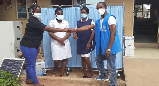 Emmanuel Chileshe Musonda (right) with team from Zambia's Ministry of Health and UNHCR Zambia while delivering medical supplies to the Mantapala refugee settlement. 